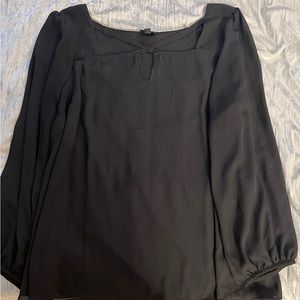 Torrid sheer long sleeve top with cris cross detail on the chest
